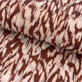 Pikowana tkanina Blurry Ikat brown