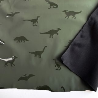 Látka na pršiplášť Dinosaurs dark green