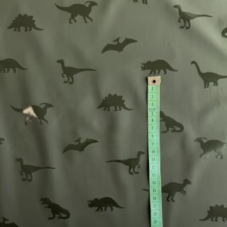 Látka na pršiplášť Dinosaurs dark green